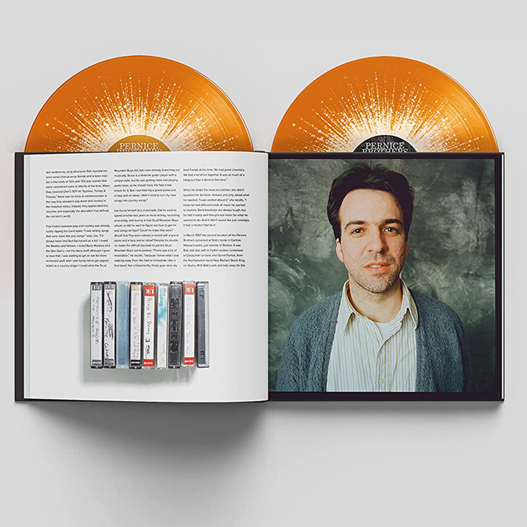 PERNICE BROTHERS - Overcome By Happiness (25th Anniversary Remastered Deluxe Edition w/ Autographed Print) - 2LP - Orange w/ White Splatter Vinyl in 52 page Hardback Book [MAY 19]